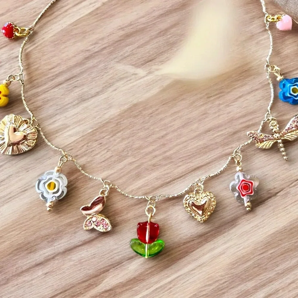 Gold and Red toned Charm Necklace glass rhinestones enamel tulip flower hearts